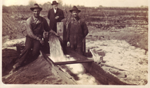 Hank Buhler near a new groundwater pump in 190